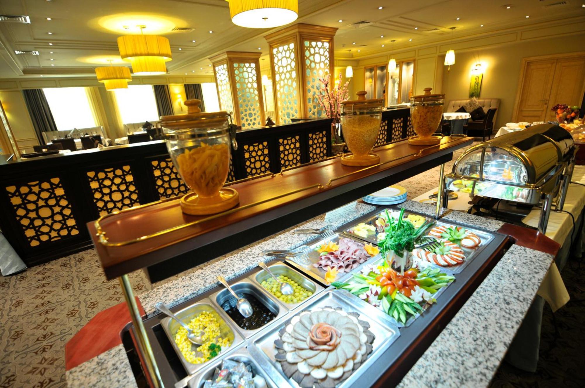 Grand Tien Shan Hotel Алма Ата Ресторант снимка